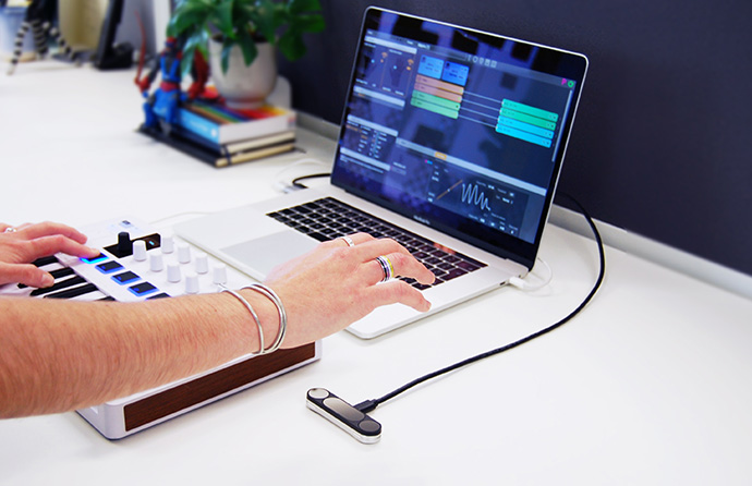 Leap Motion Controller connected to a Macbook Pro using music software